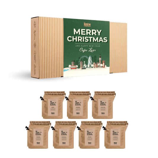MERRY CHRISTMAS COFFEE GIFT BOX by Brew Blend featuring six coffee bags and festive packaging with holiday graphics.